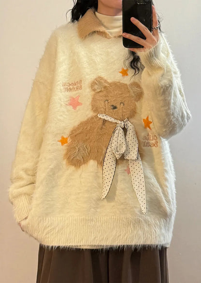 A Vintage Style Sweater with Delicate Timeless Details
