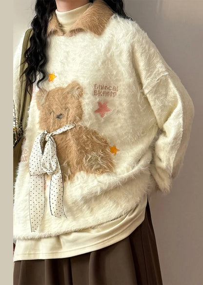 A Vintage Style Sweater with Delicate Timeless Details