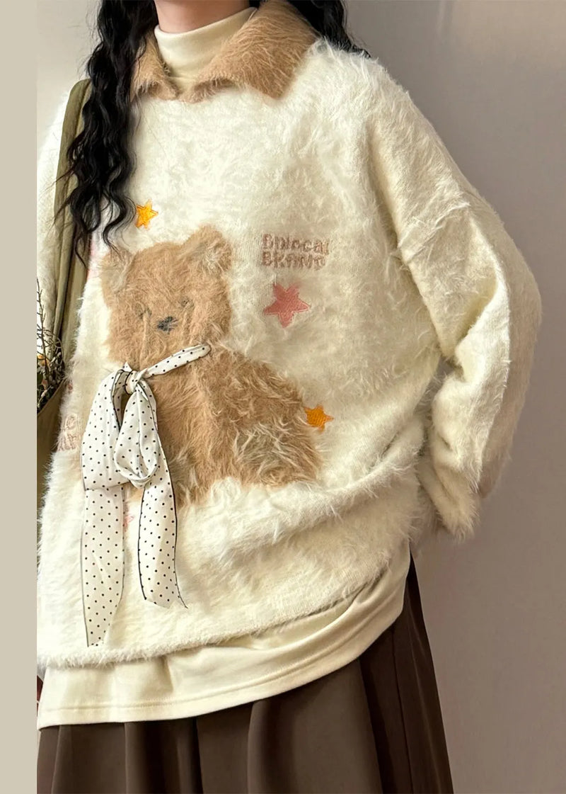A Vintage Style Sweater with Delicate Timeless Details